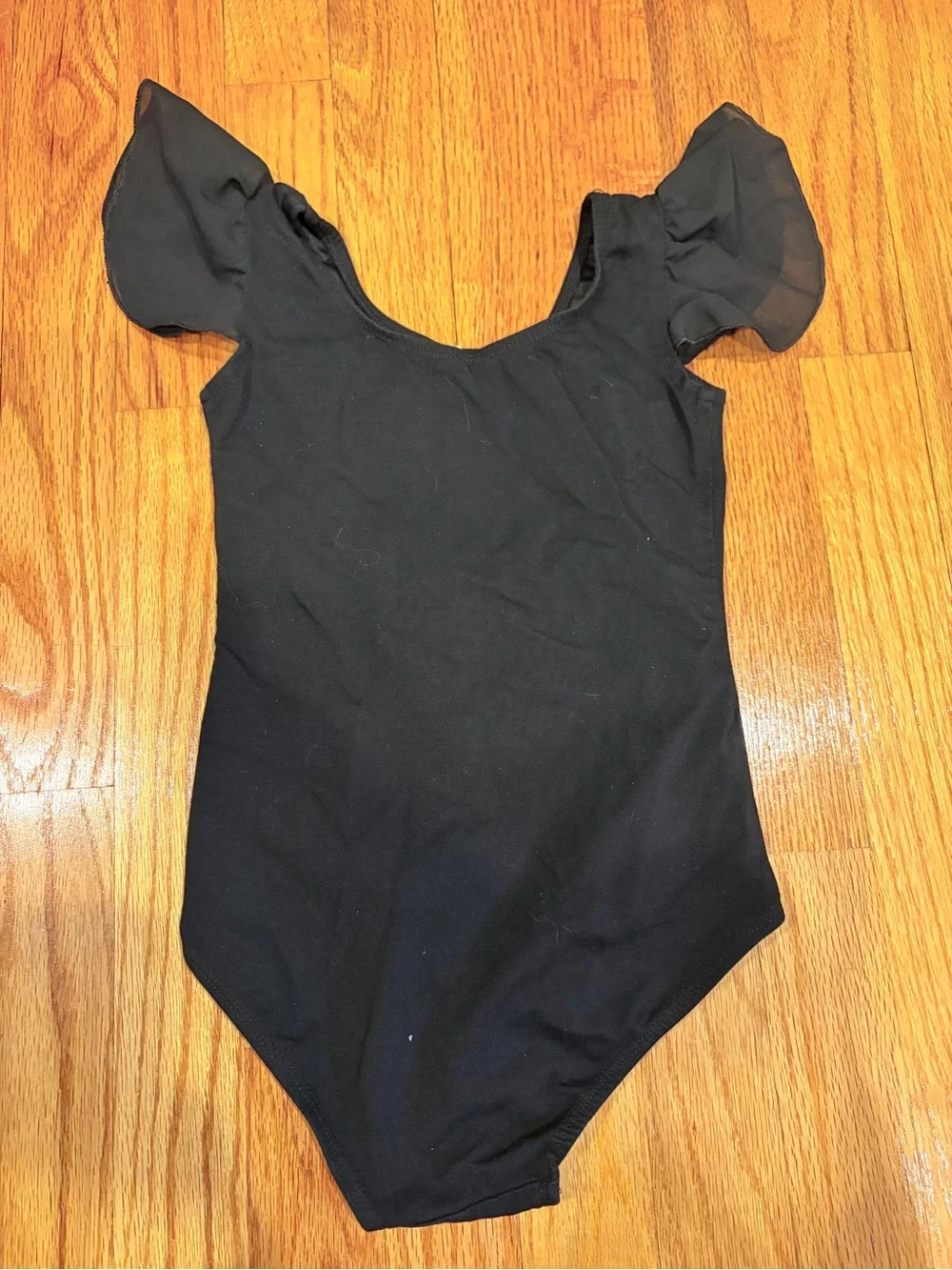 Black Kids One-Piece Bodysuit with Sheer Flutter Sleeves